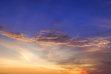 Obraz premium Dramatic colorful sunset seascape at Parangtritis Beach, Yogyakarta with ocean waves and silhouettes