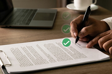 Completed contract signature and approval confirmation with verification and compliance workflow in professional business office setting.