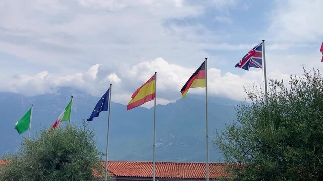 Flags of Europe and european countrys in front of a mountain landscape