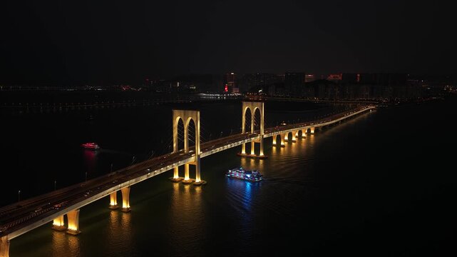 Aerial view of the sai van bridge in macau at night