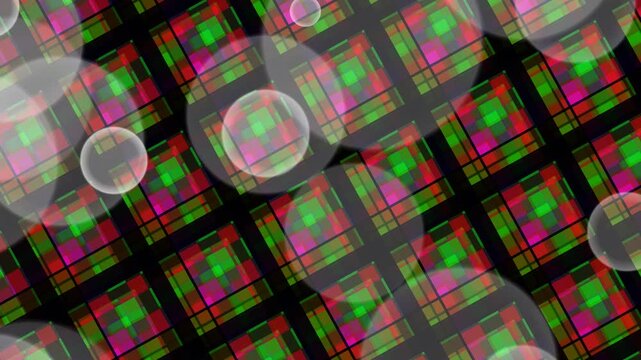 Bubbles floating over a vibrant plaid pattern with colorful grid design