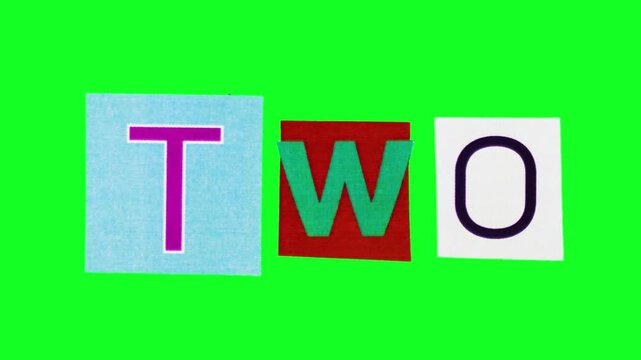 cutout letters spelling Two on green background made from colorful newspaper, tactile paper collage with handcut letters, handcrafted stopmotion vibe, Stickers are crumpled on green screen