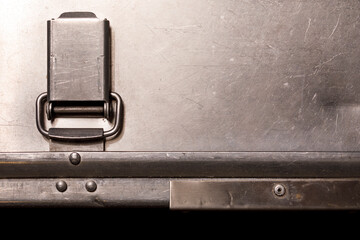Close up shot of metallic industrial latch and rivets, showcasing texture and detail, perfect for commercial use.