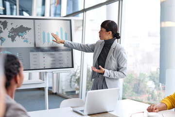 Group of young business people having a meeting or presentation and seminar with digital display whiteboard in the office. Portrait of a young businesswoman leader