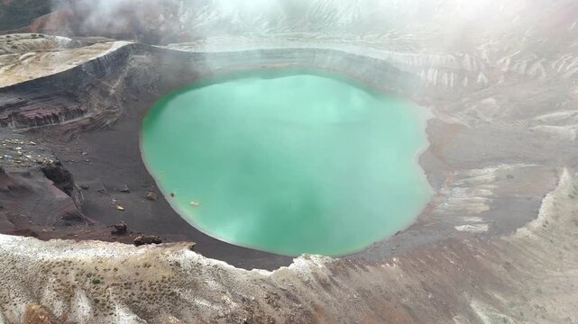 Vivid Emerald Crater Lake | Mt. Zao | Japan - 4K Aerial Video
