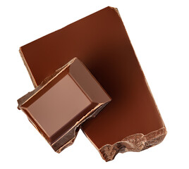 Broken chocolate bar pieces isolated on white. Milk Chocolate chunks flying in air. Levitation. Top view. Flat lay