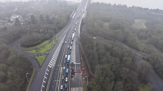 traffic congestion on foggy bridge toll road, Humber Bridge East Yorkshire 