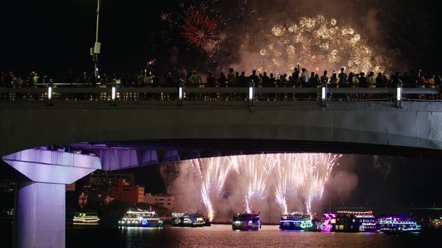 Nighttime Fireworks Celebration Above Modern City