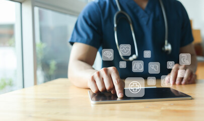 Fototapeta premium close up expertise doctor man hand check on digital tablet about health checkup program annual to prepare for consulting and diagnosis of patient for healthcare and technology concepr