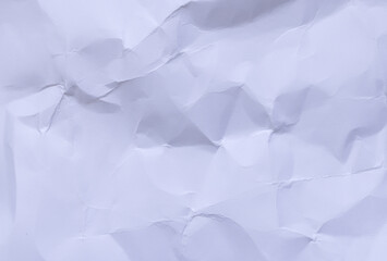 Obraz premium Crumpled White Paper Texture Background with Soft Shadows,A top-down, close-up view of a wrinkled and crumpled white paper sheet, showcasing a detailed abstract texture with subtle highlights.