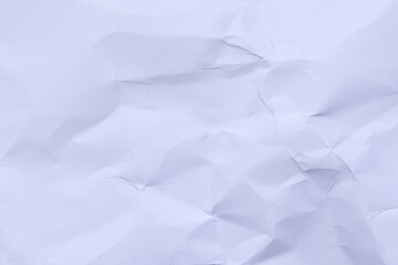 Fototapeta premium Crumpled White Paper Texture Background with Soft Shadows,A top-down, close-up view of a wrinkled and crumpled white paper sheet, showcasing a detailed abstract texture with subtle highlights.