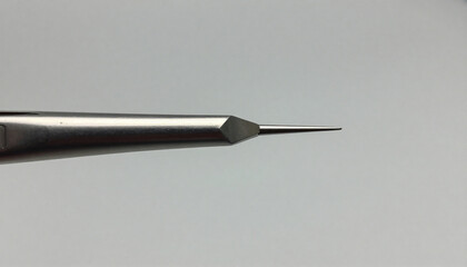 Naklejka premium Surgical Tweezers Precision Shot