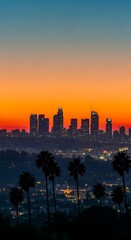 Fototapeta premium City skyline at dusk with palm trees in the foreground.