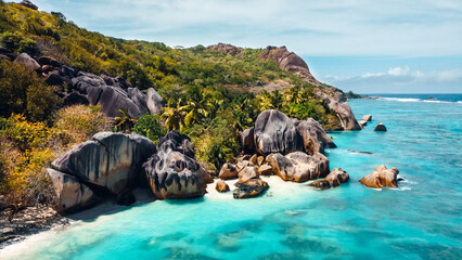 Aerial view of Anse Source d'Argent beach, La Digue, Seychelles, featuring iconic granite boulders,...