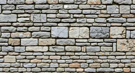 Obraz premium Seamless pattern of rustic aged French limestone masonry wall with weathered antique stone texture ideal for historic architectural backgrounds and vintage construction surface design