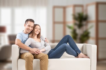 Fototapeta premium Happy young couple relaxing at home