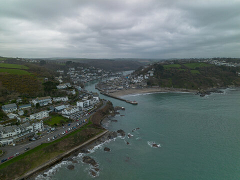 Aerial view of Looe harbour and coastal town in Cornwall
