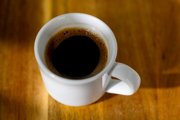 Fototapeta premium Traditional Turkish coffee cup on wooden table