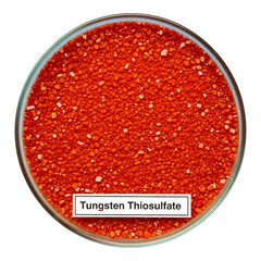 Red tungsten thiosulfate powder in a clear glass container on a white background isolated