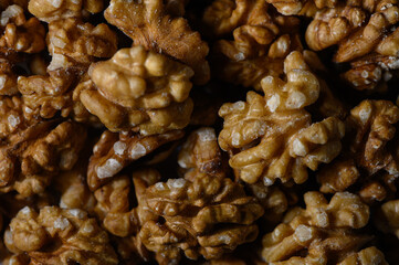 Obraz premium Background of Georgian Walnut Kernels in Dezerter Market Style Authentic Texture
