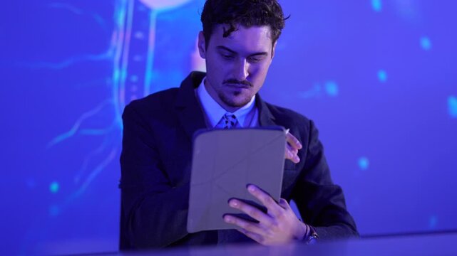 Chief Technology Officer monitoring global telecommunications infrastructure on digital tablet. Male executive analyzing international network operations center data against futuristic globe visualiza