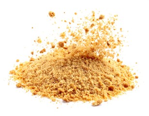 Pile of brown crumbs with some crumbs suspended mid-air, isolated on white