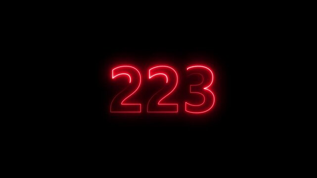 Neon number 223 glowing bright on black background  4k video..
