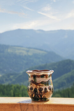 Kosiv ceramics cup featuring traditional Hutsul patterns, a handmade art form recognized by UNESCO