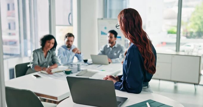 Boardroom, team and woman with laptop, presentation and brainstorming for financial growth with info. Happy, speaker and people with research for investment proposal, meeting and colleagues with tech