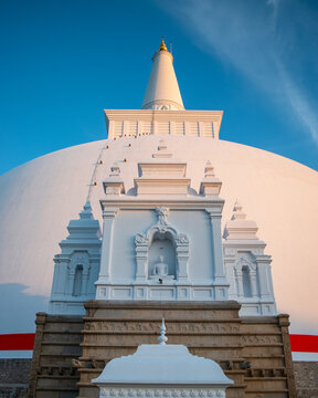 Ruwanweliseya Stupa, Anuradhapura, Sri Lanka, White Buddhist Dagoba with Ornate Vahalkada Entrance Facade, Sacred Pilgrimage Temple and UNESCO Heritage Landmark Under Blue Sky, Travel Photo