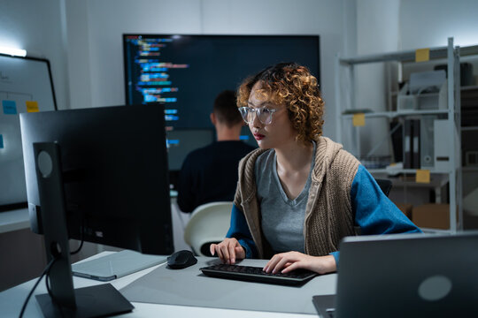 software engineer or programmer team working late in development office,problem solving or algorithm of ai assistant helping for work.software developer,digital technology security concept