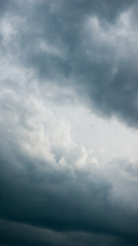 Gray contrasting fluffy storm clouds