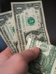 one, one dollar, dollars in the hand © Fulop