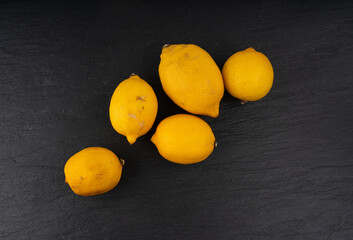 Old dried lemons. Fruits with darkened skins