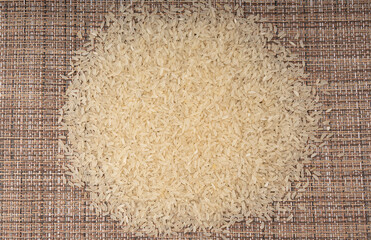 White parboiled rice grains. Dry uncooked ponni rice, small organic basmati
