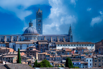 Naklejka premium Siena Cathedral and cityscape with bell tower and dome