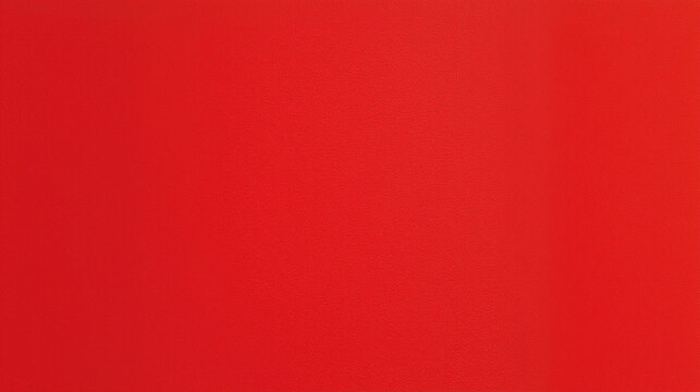 A solid red background with a smooth texture. The color is vibrant and uniform, creating a bold visual impact.