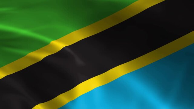 Waving flag of Tanzania national symbol with green black and blue stripes bordered by yellow representing patriotism and country pride