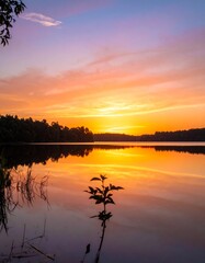 Naklejka premium Sonnenuntergang über ruhigem See