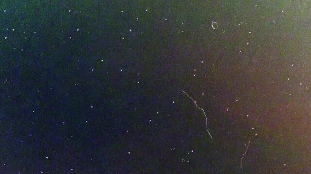 Vintage old film overlay featuring burn leaks and grunge scratch damage
