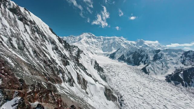Drone video of Zvezdochka Glacier and Pobeda Peak. Mountains of Kyrgyzstan. Tian Shan. 4K