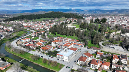 Obraz premium Aerial drone photo of iconic Byzantine castle of Trikala ancient citadel built northeastern side of the city in a small hill featuring clock tower with great views in old city of Trikala, Thessaly, Gr