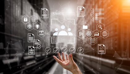 A hand reaches towards a digital network, showcasing various documents and icons representing data...