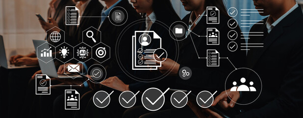 Business professionals focus on digital document management and data analysis, representing teamwork and efficiency in a corporate environment, fostering innovation and collaboration. Gantry