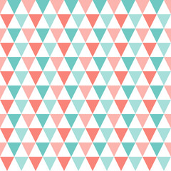 Fototapeta premium Pastel triangle seamless pattern in coral and mint on light background. Modern geometric design ideal for textile, wallpaper and creative branding.
