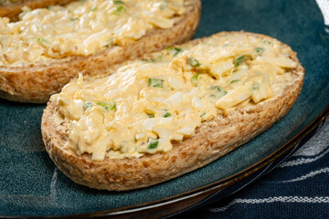 Breakfast sandwiches on plate.