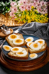 Whole wheat sandwich with boiled eggs.