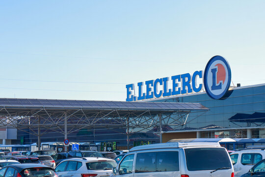 Pamplona, ​​Spain, February 23, 2026. An E.Leclerc shopping center on a sunny day. The building features modern architecture with large reflective glass panels and a circular blue and red logo 