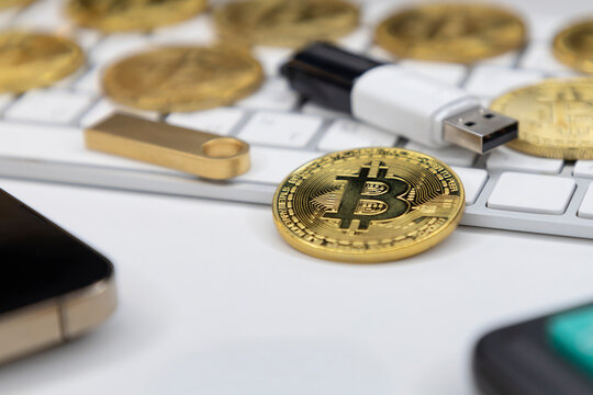 Bitcoin stack and smartphone, crypto wallet. digital currency storage