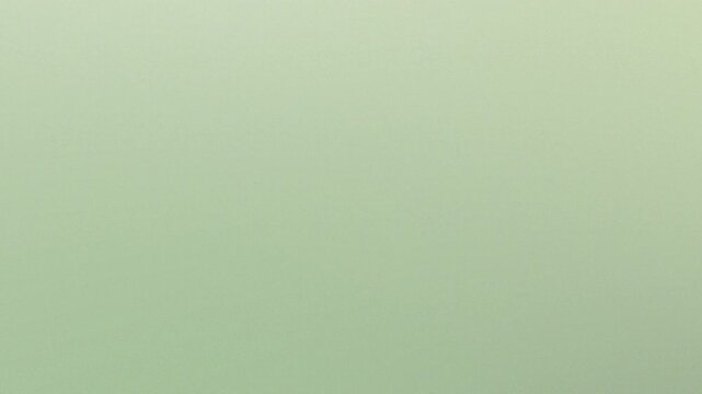 Emerald Green Texture: A minimalist shot of a seamless emerald green surface, ideal for backgrounds. The understated elegance of the verdant hue conveys tranquility and freshness. 